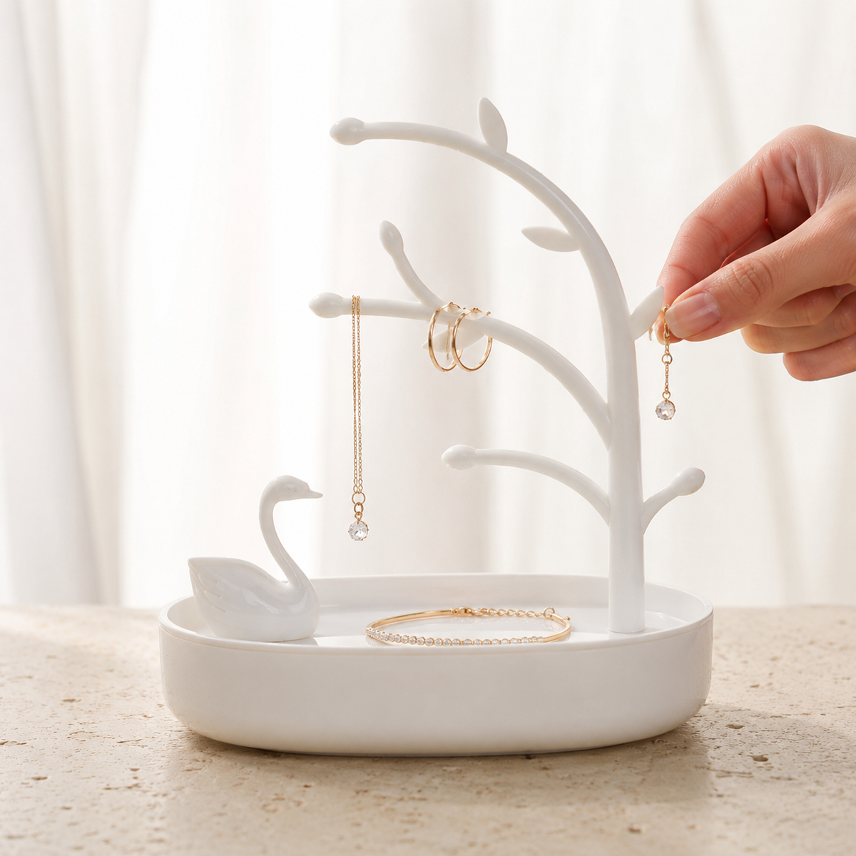Arbre a bijoux avec cygne blanc - mise en main