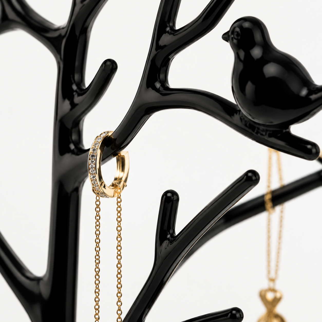 Arbre a bijoux avec oiseaux noir - detail studio oiseau Image